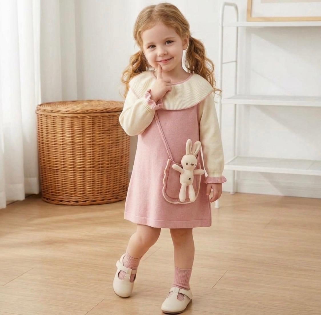 Vestido rosado con mangas crema de la colección